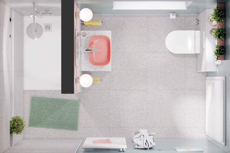 Bovenaanzicht van een lichte badkamer met douche, wastafel, toilet en decoratie