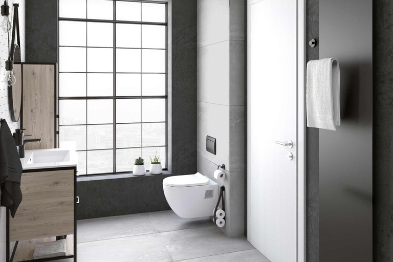 Moderne badkamer met wastafel, wandcloset, raam en radiator