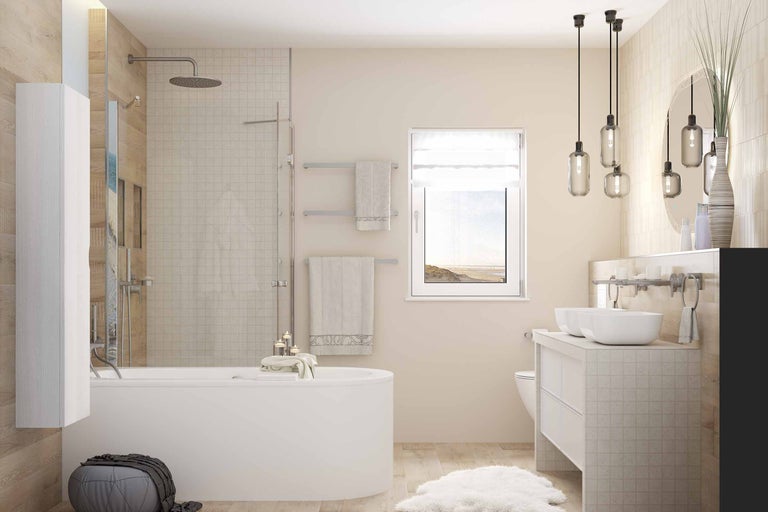 Lichte badkamer met bad, douche, wastafel en raam