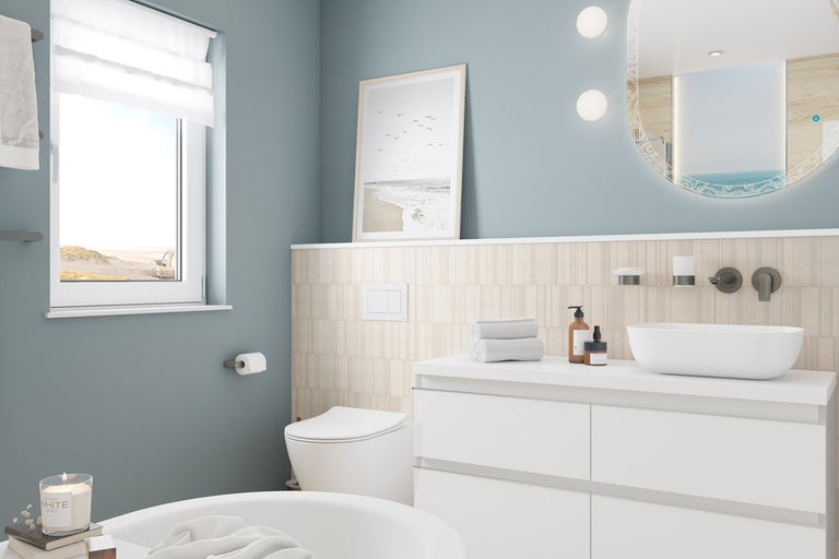 Moderne badkamer met wastafel, spiegel en toilet