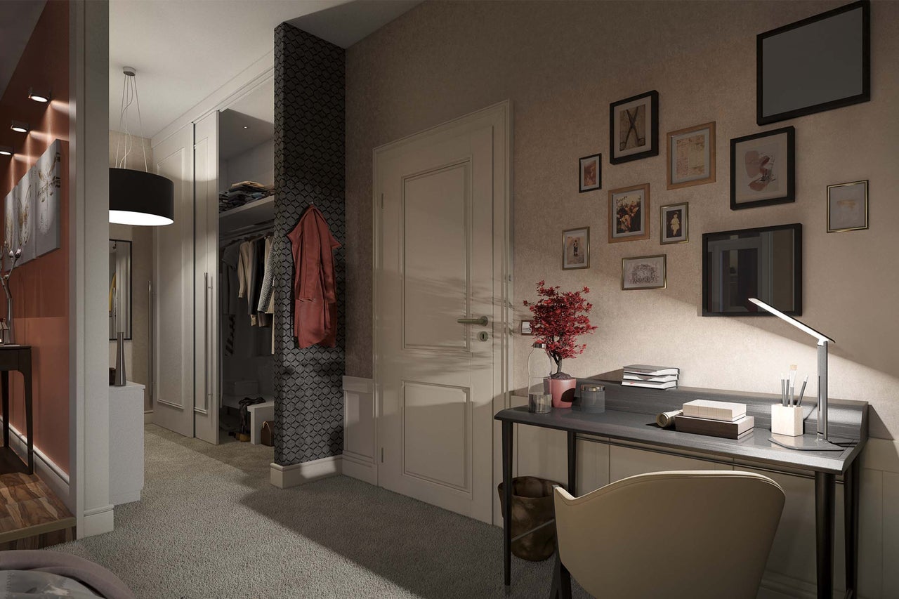 Interieurbeeld van een werkkamer met bureau, stoel en diverse decoraties