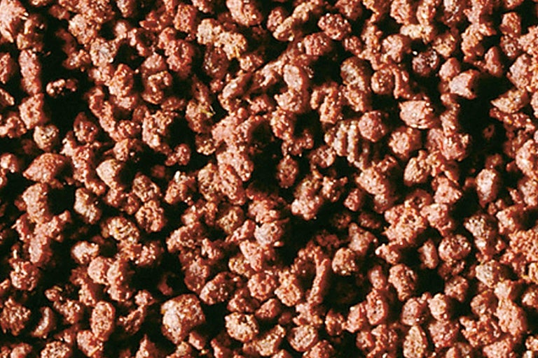 Close-up van meststofgranulaat voor planten