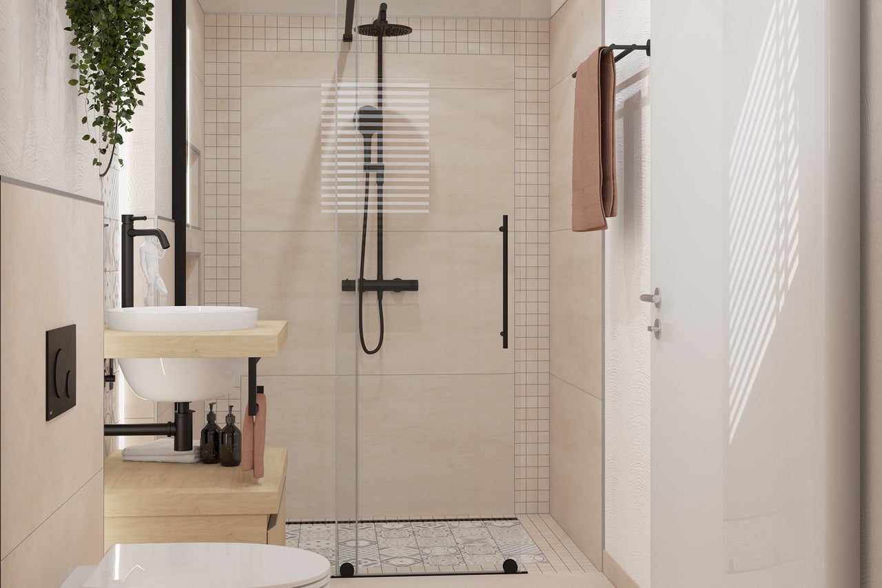Badkamer met douche, wastafel en toilet in modern design