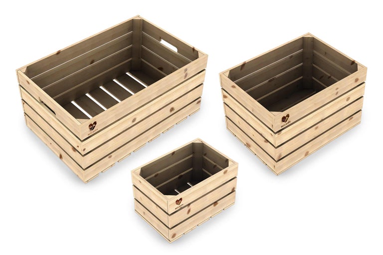 Drie houten kisten in verschillende maten
