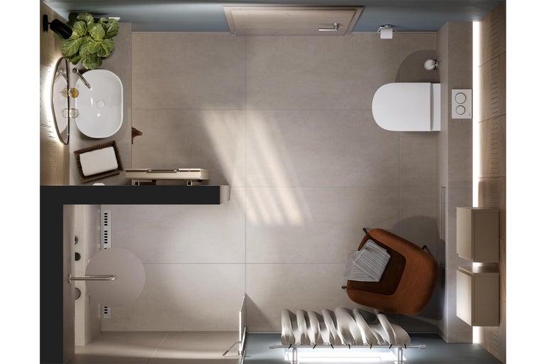 Bovenaanzicht van een lichte badkamer met toilet, wastafel, handdoekradiator en fauteuil