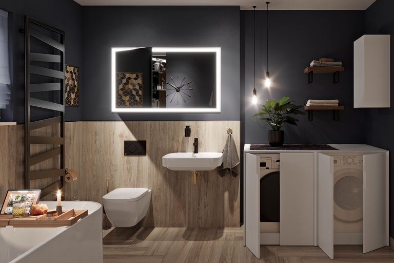 Moderne badkamer met bad, wastafel, toilet, verlichte spiegel en wasmachine