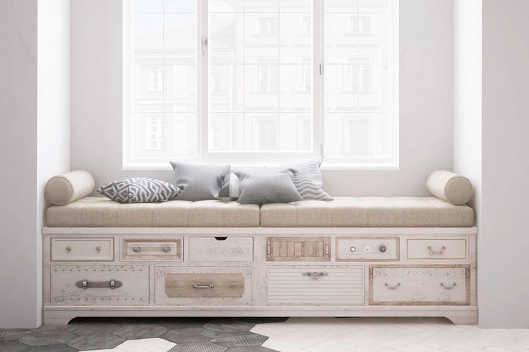 Vensterbank met opbergruimte, zitkussen en kussens