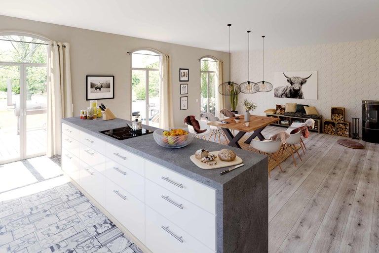 Lichte woonkamer met kookeiland, eettafel en decoraties in moderne stijl