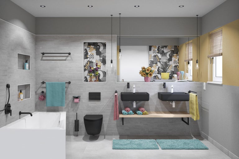 Lichte badkamer met bad, wastafels en toilet