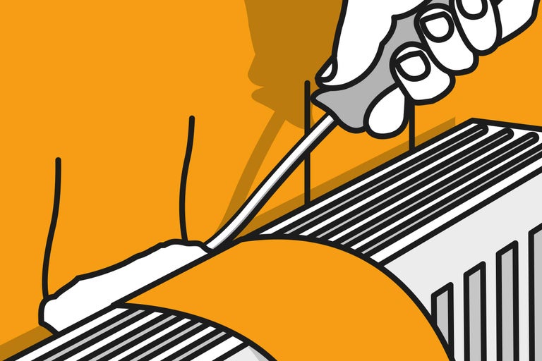 Een persoon past met een schroevendraaier een radiatorkraan aan.