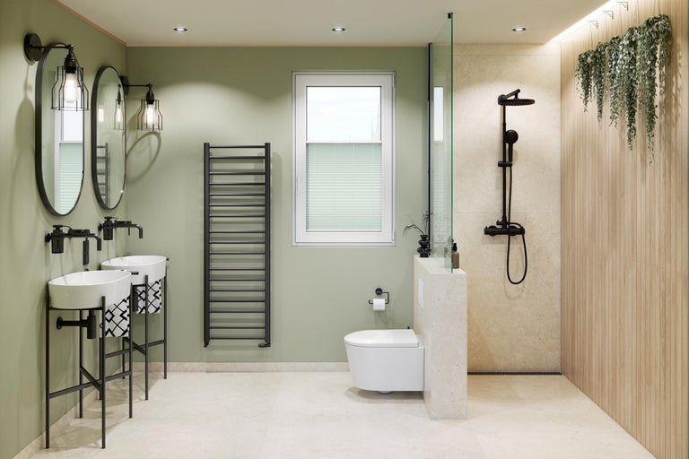 Badkamer met dubbele wastafel, radiator, toilet en douche