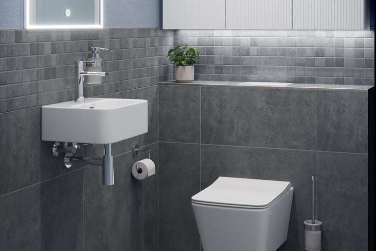 Badkamer met wastafel, toilet en grijze tegels