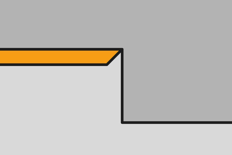 Afbeelding van een gipsplatenwand met een uitstekende rand