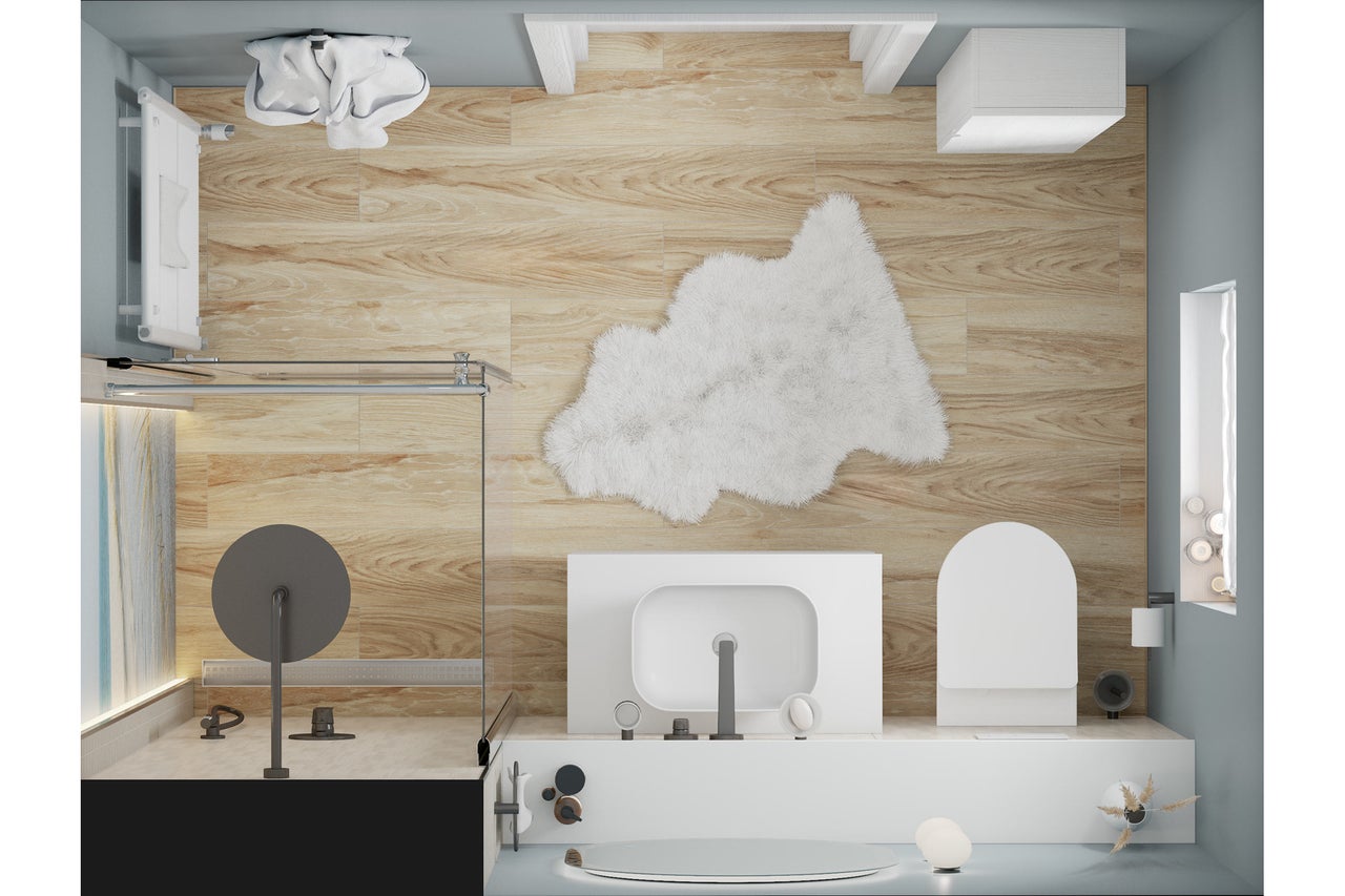 Bovenaanzicht van een heldere badkamer met douche, wastafel, toilet en houten vloer