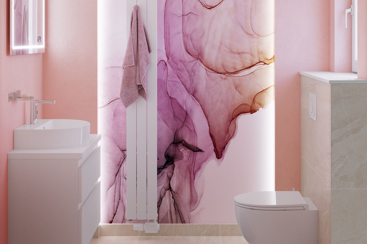 Lichte badkamer met wastafel, handdoekradiator en toilet