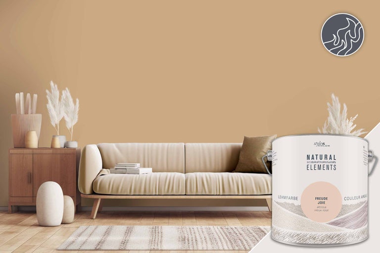 Voorbeeld van een woonkamer in zandkleuren met een verfblikmotief