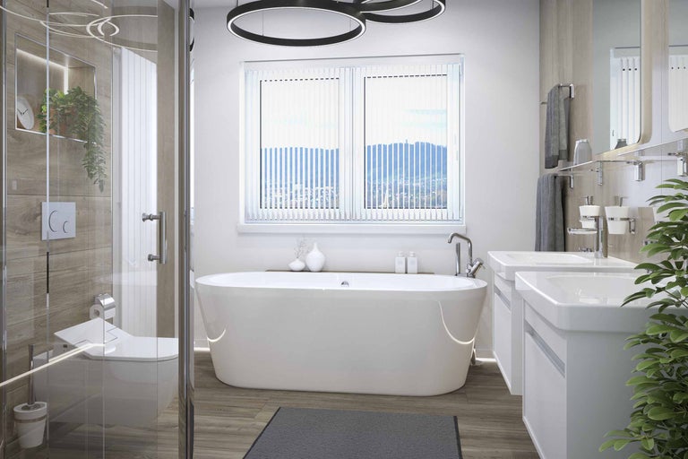 Lichte badkamer met bad, wastafel en douche