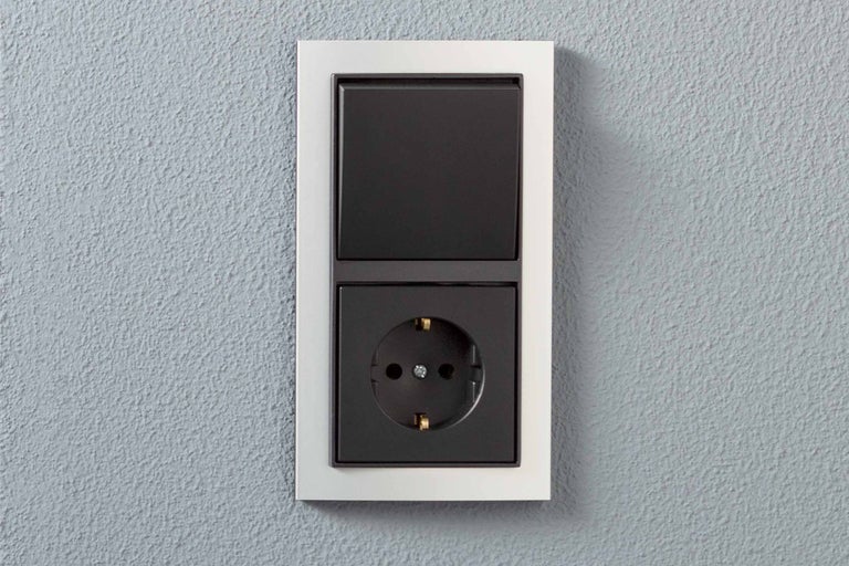 Lichtschakelaar en stopcontact met frame