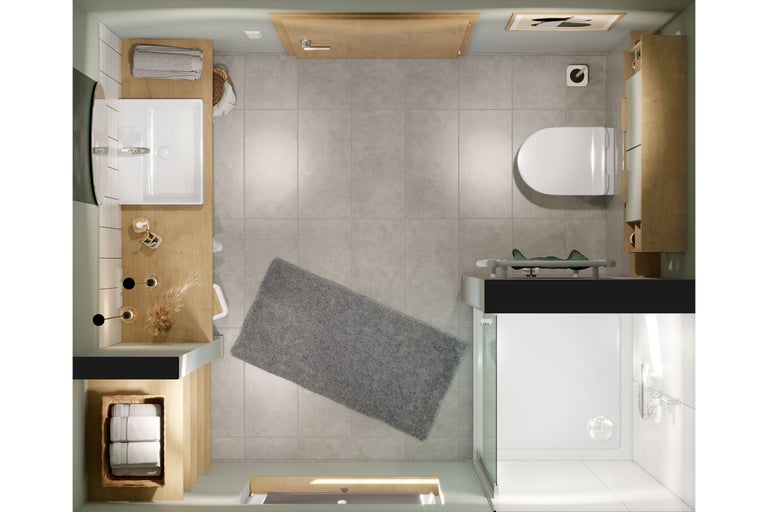 Bovenaanzicht van een badkamer met wastafel, toilet en douche