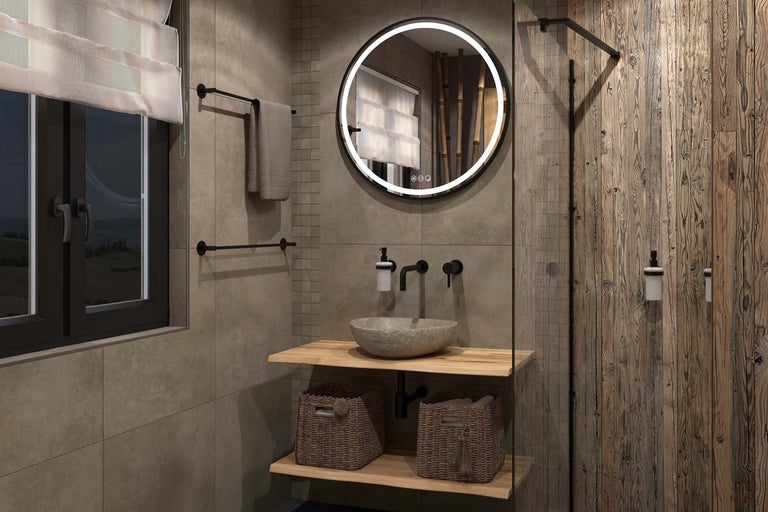 Moderne badkamer met ronde LED-spiegel, stenen waskom op houten planken, wandkranen en tegels met steenlook.