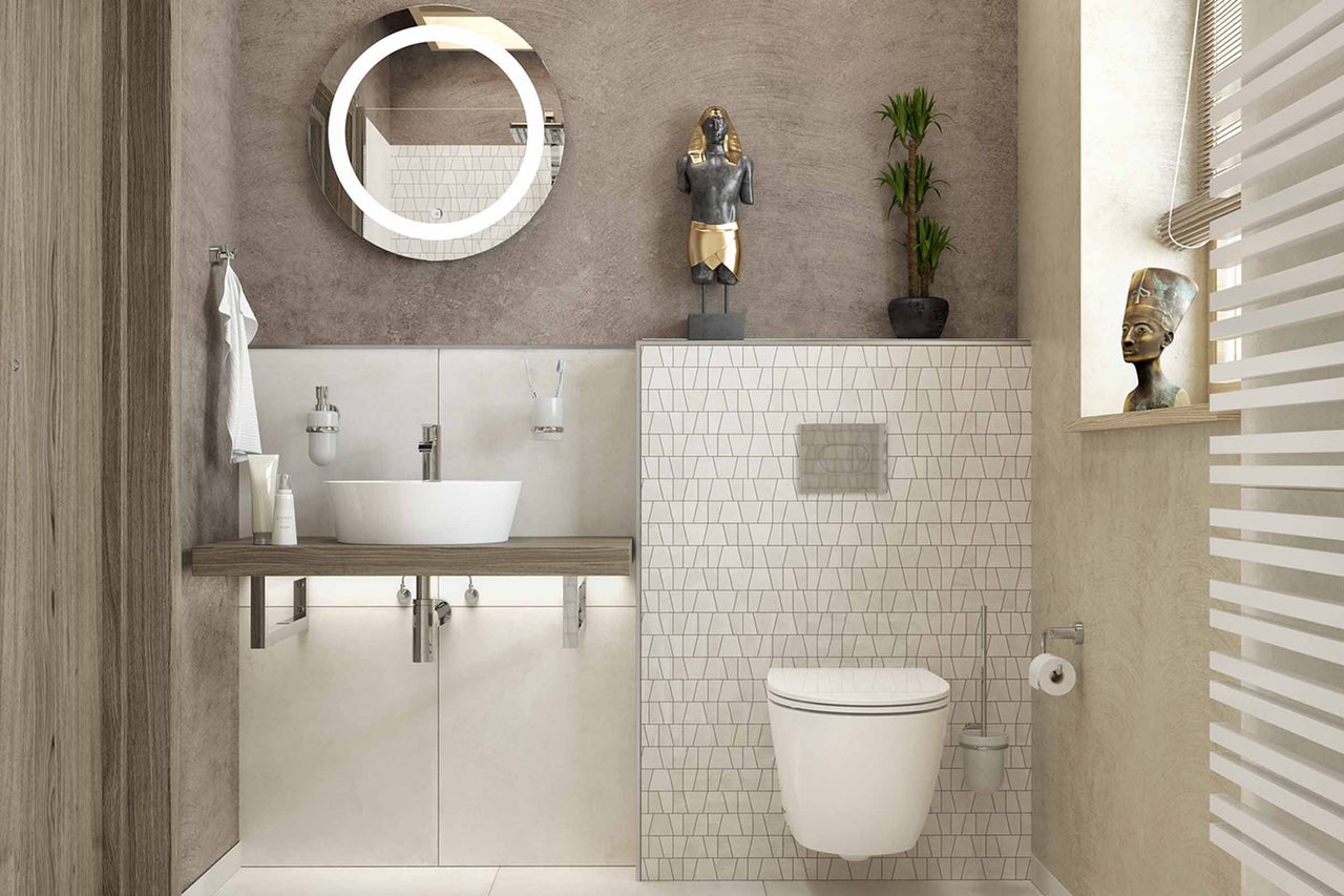 Moderne badkamer met wastafel, spiegel, toilet en radiator