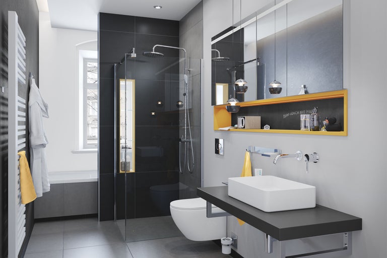 Badkamer met douche, wastafel, spiegelkast en radiator