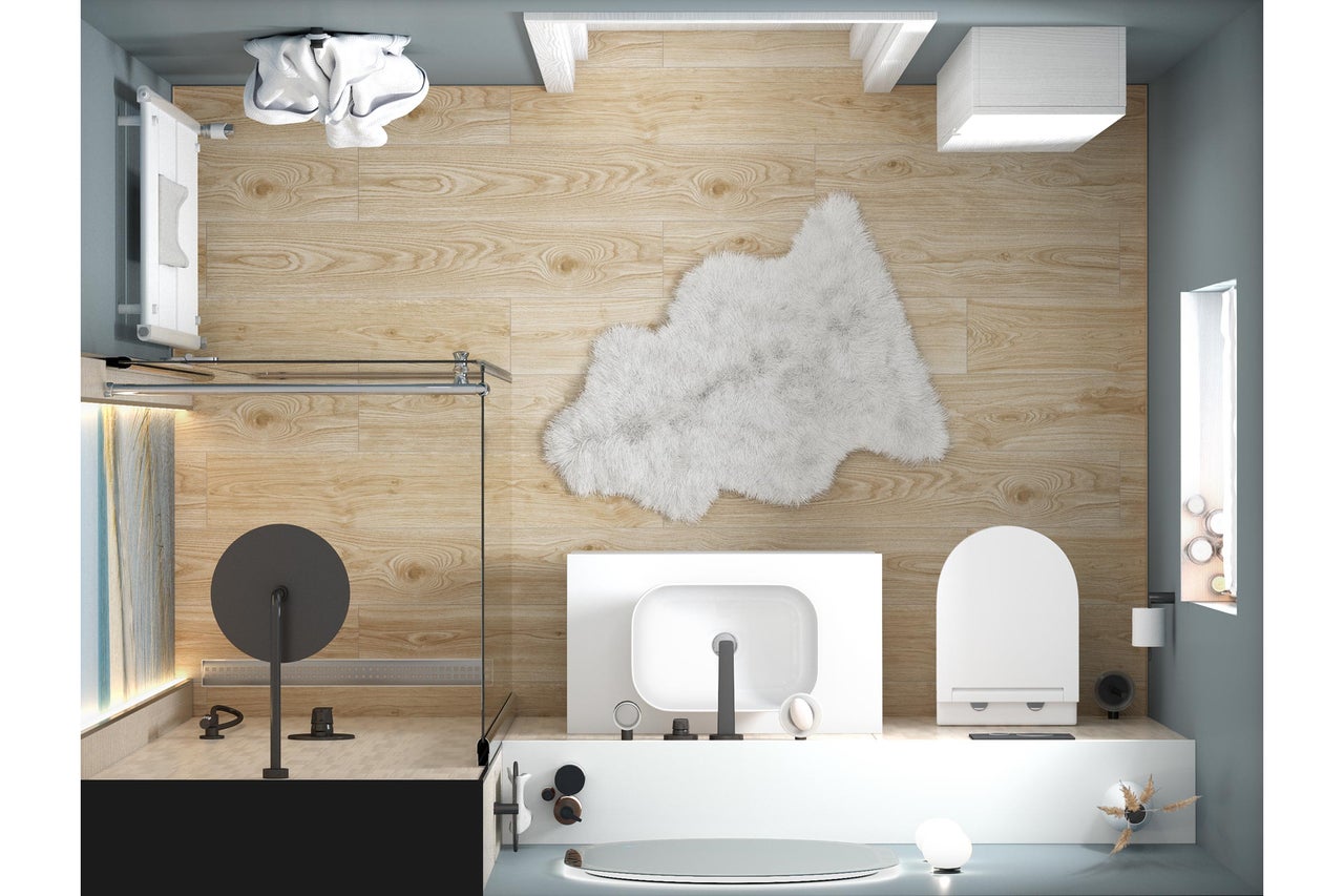 Moderne badkamer met tegels in houtlook, inloopdouche, witte wastafel, toilet en pluizig tapijt.