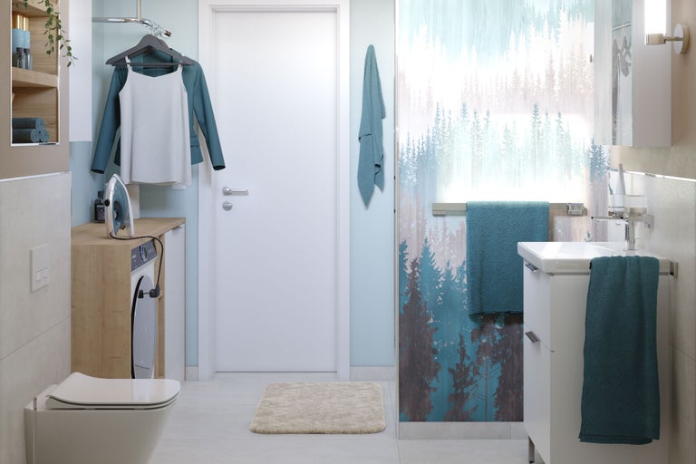 Moderne badkamer met wasmachine, wastafel, toilet en decoratie