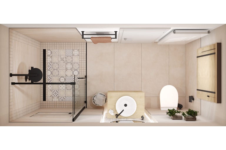 Overzicht van een badkamer met douche, wastafel, toilet en badkamermeubels.