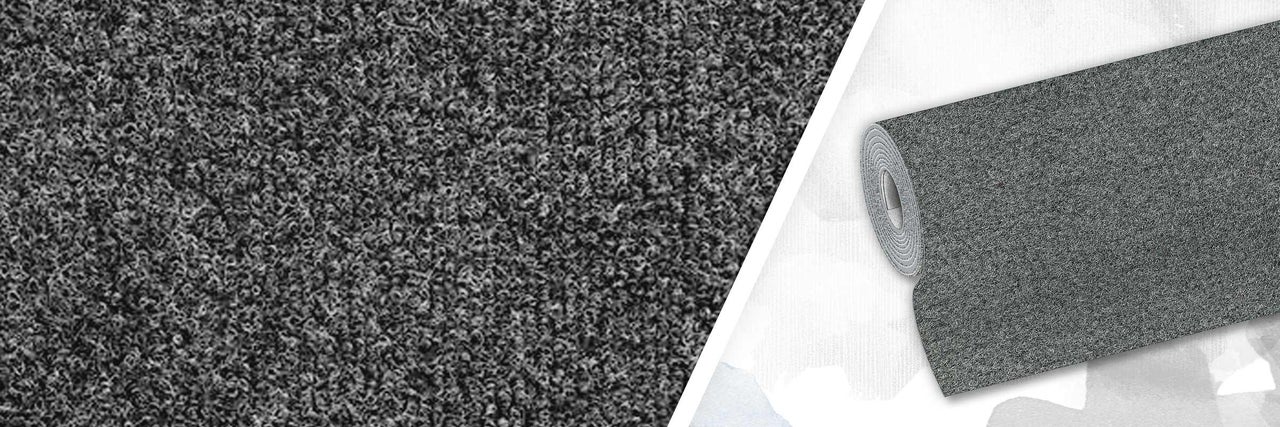 Grijs tapijt als rol en als vloerbedekking