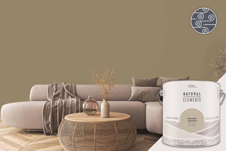 Woonkamer met leemverf in maangrijs en verfblik