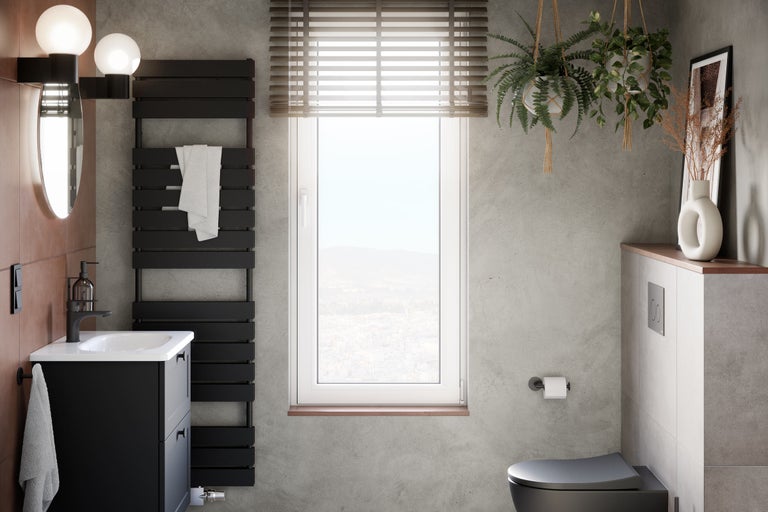 Moderne badkamer met wastafel, radiator, raam en decoratie