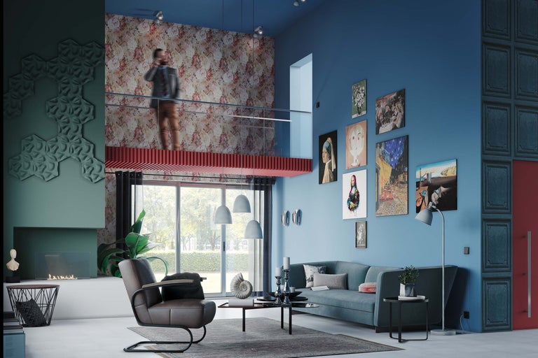 Woonkamer met bank, fauteuil, salontafel en kunst aan de muren