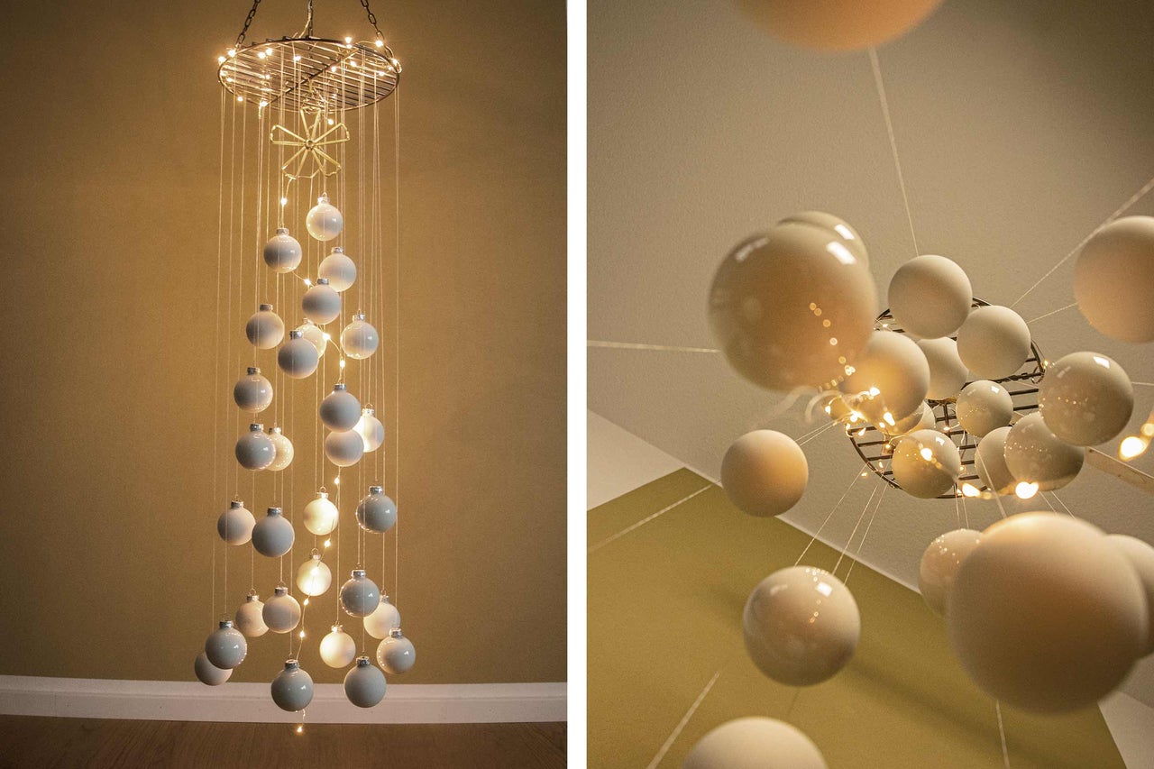 Decoratieve hanglamp met bollen en fijne lichtkettingen voor binnen