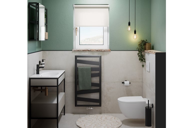 Moderne badkamer met wastafel, radiator en toilet.