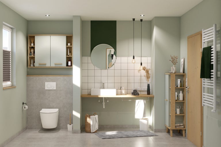 Lichte badkamer met wastafel, spiegel, toilet en radiator