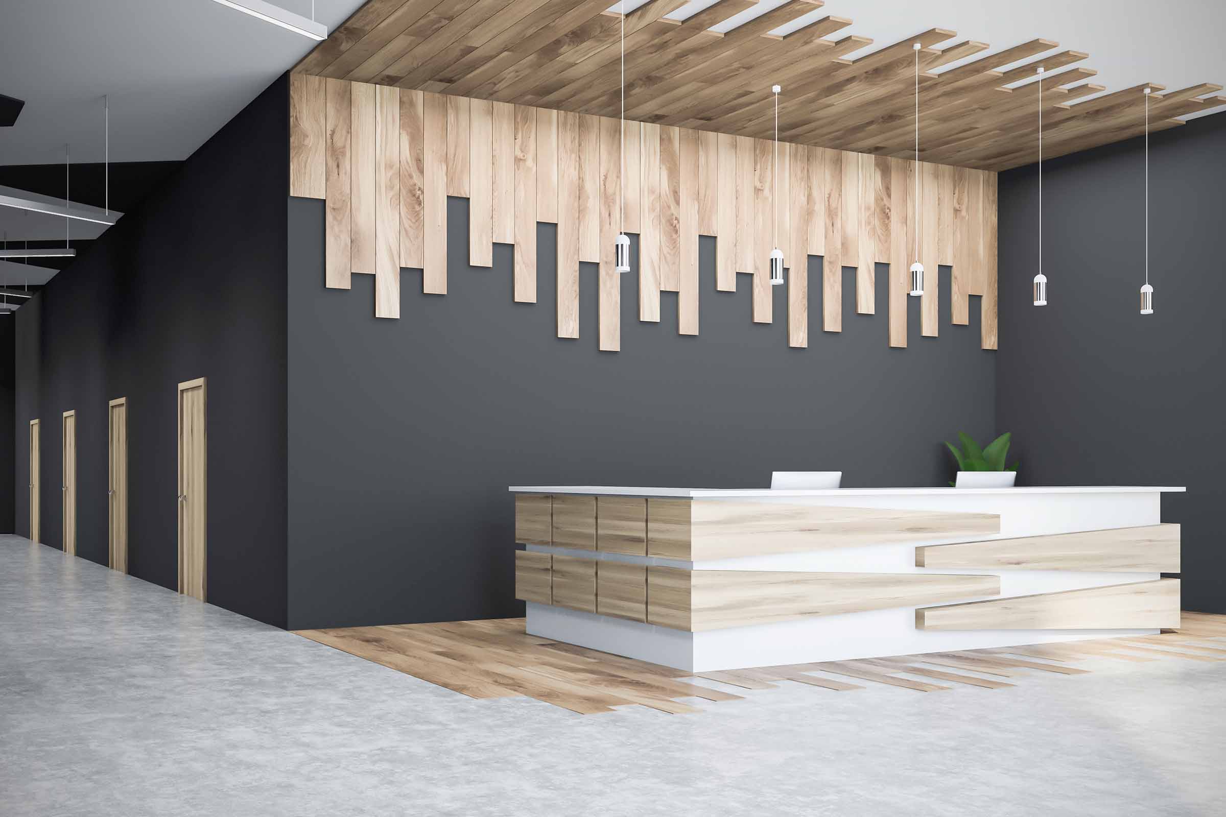 Houten kantoorlobby met receptie en hanglampen.