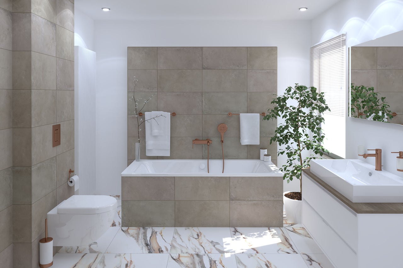 Moderne badkamer met ligbad, wastafel en tegels in aardetinten