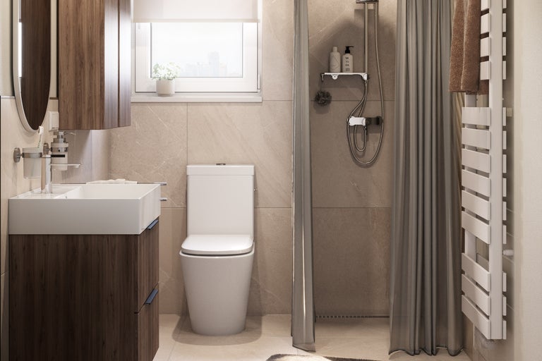 Badkamer met wastafel, toilet en douche