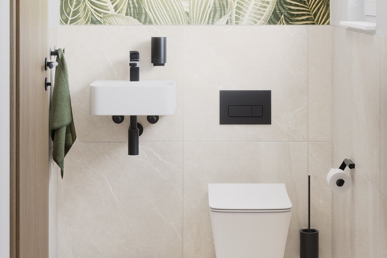 Badkamer met wastafel, toilet en accessoires