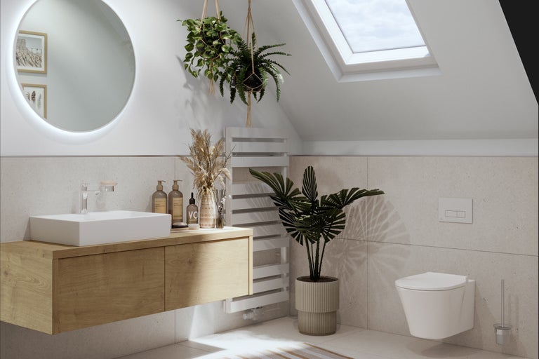 Lichte badkamer met wastafel, spiegel, radiator en dakraam