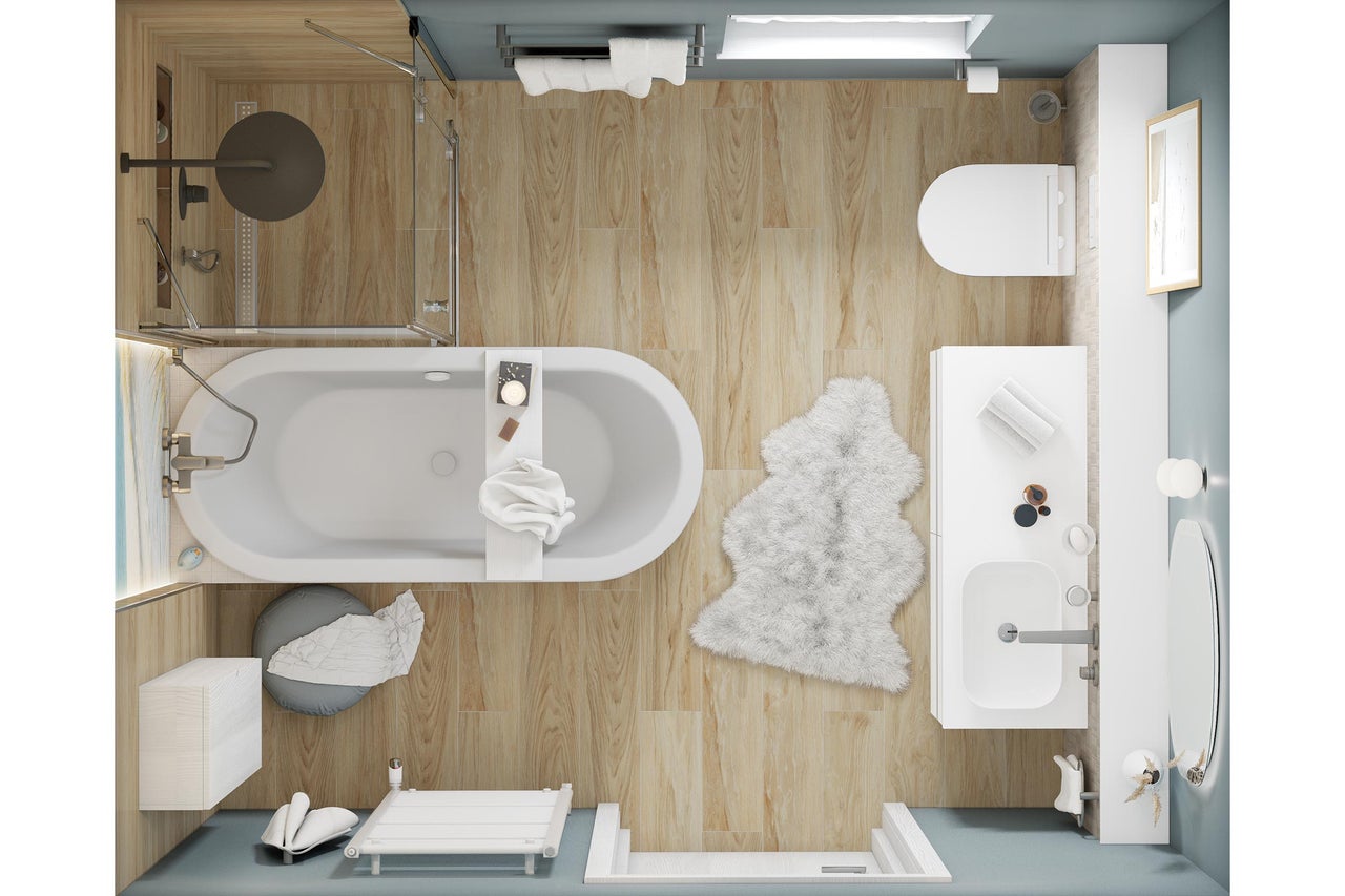 Bovenaanzicht van een lichte badkamer met ligbad, douche, toilet en wastafel