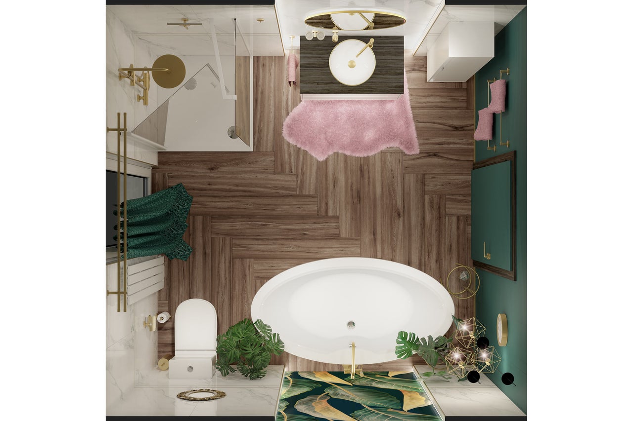 Bovenaanzicht van een moderne badkamer met vrijstaand bad, douche, houtlook vloer in visgraatmotief, gouden kranen en groene wanden.