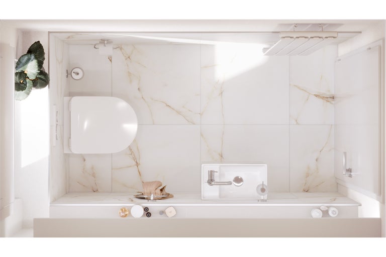 Overzicht van een badkamer met toilet, wastafel en douche