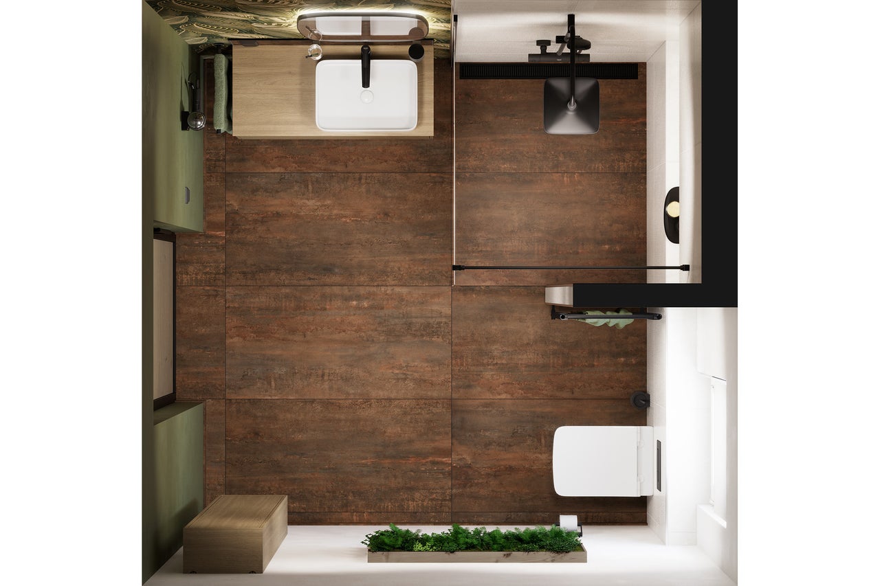 Bovenaanzicht van een moderne badkamer met vloertegels in roestlook, een wastafel op houten meubel, douche en toilet.