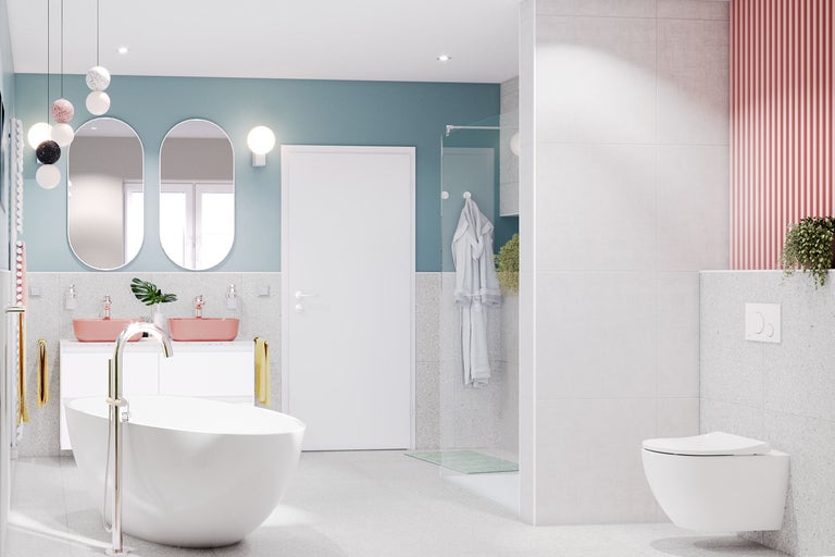 Moderne badkamer met bad, wastafels en toilet