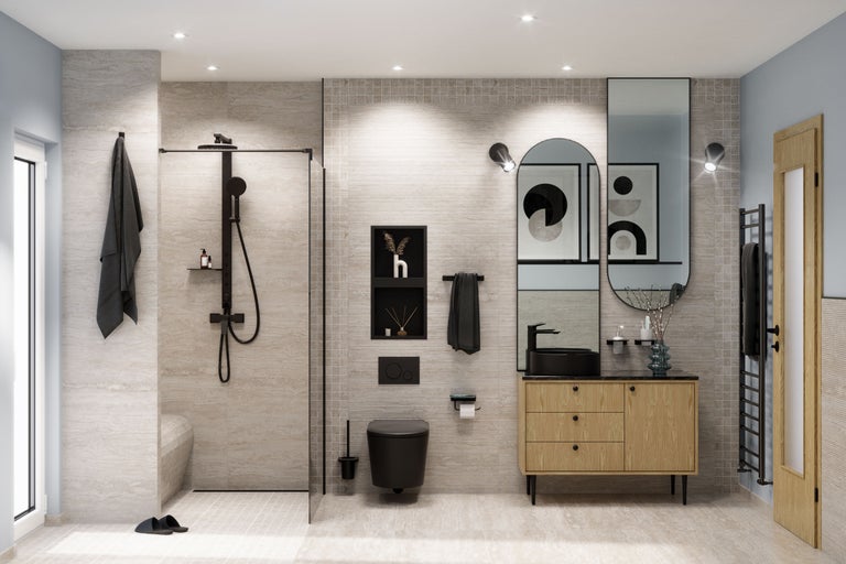 Moderne badkamer met douche, wastafel, spiegel en toilet.