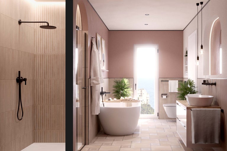 Lichte badkamer met douche, vrijstaand bad, wastafel en toilet