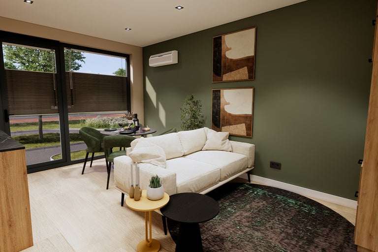 Woonkamer met bank, tafel, stoelen en decoratie