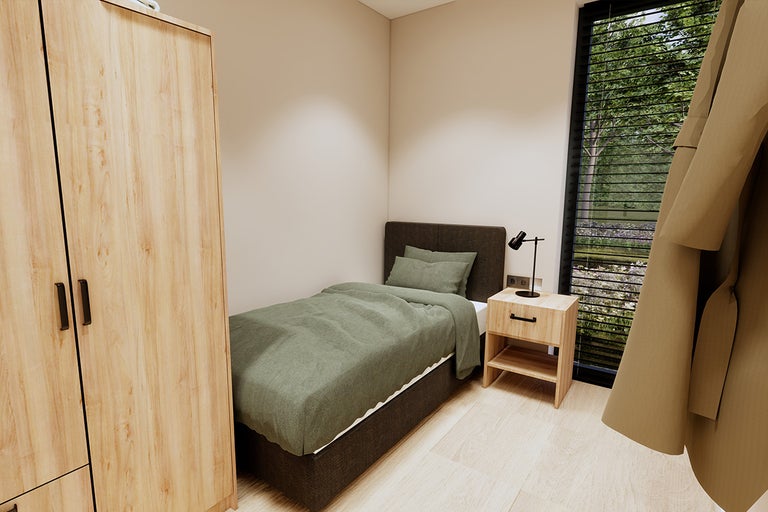 Lichte slaapkamer met eenpersoonsbed, kledingkast en bedlampje